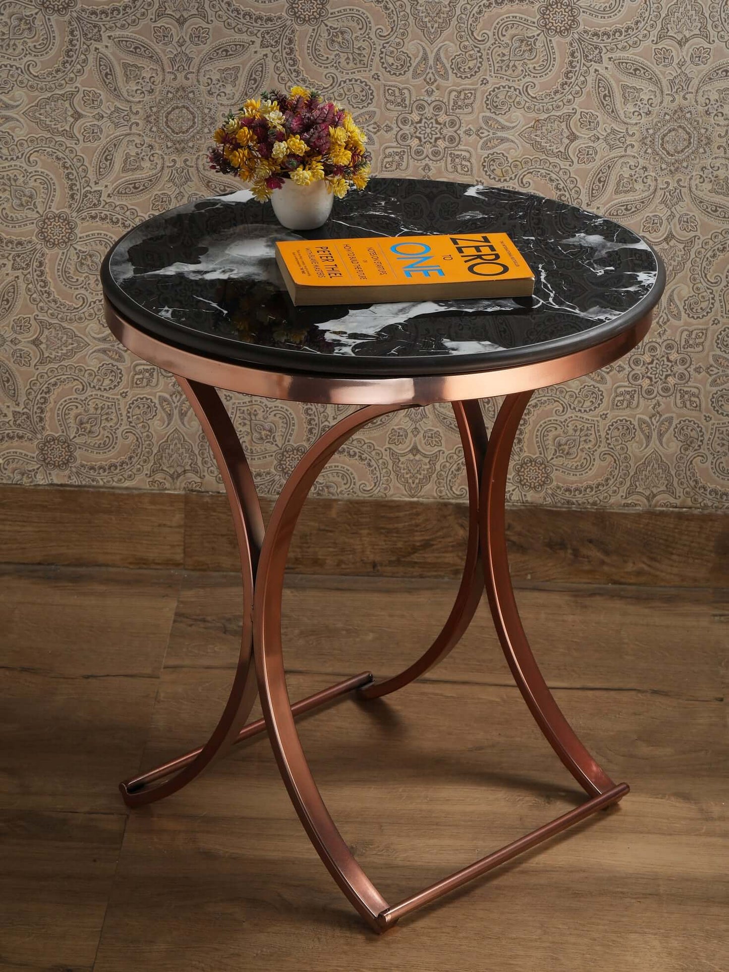 Stunning rose gold side table , featuring a sleek design and elegant finish for a luxurious touch to any room